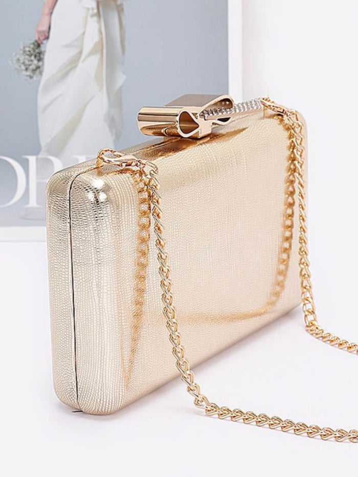 Metal Ribbon Top Clutch