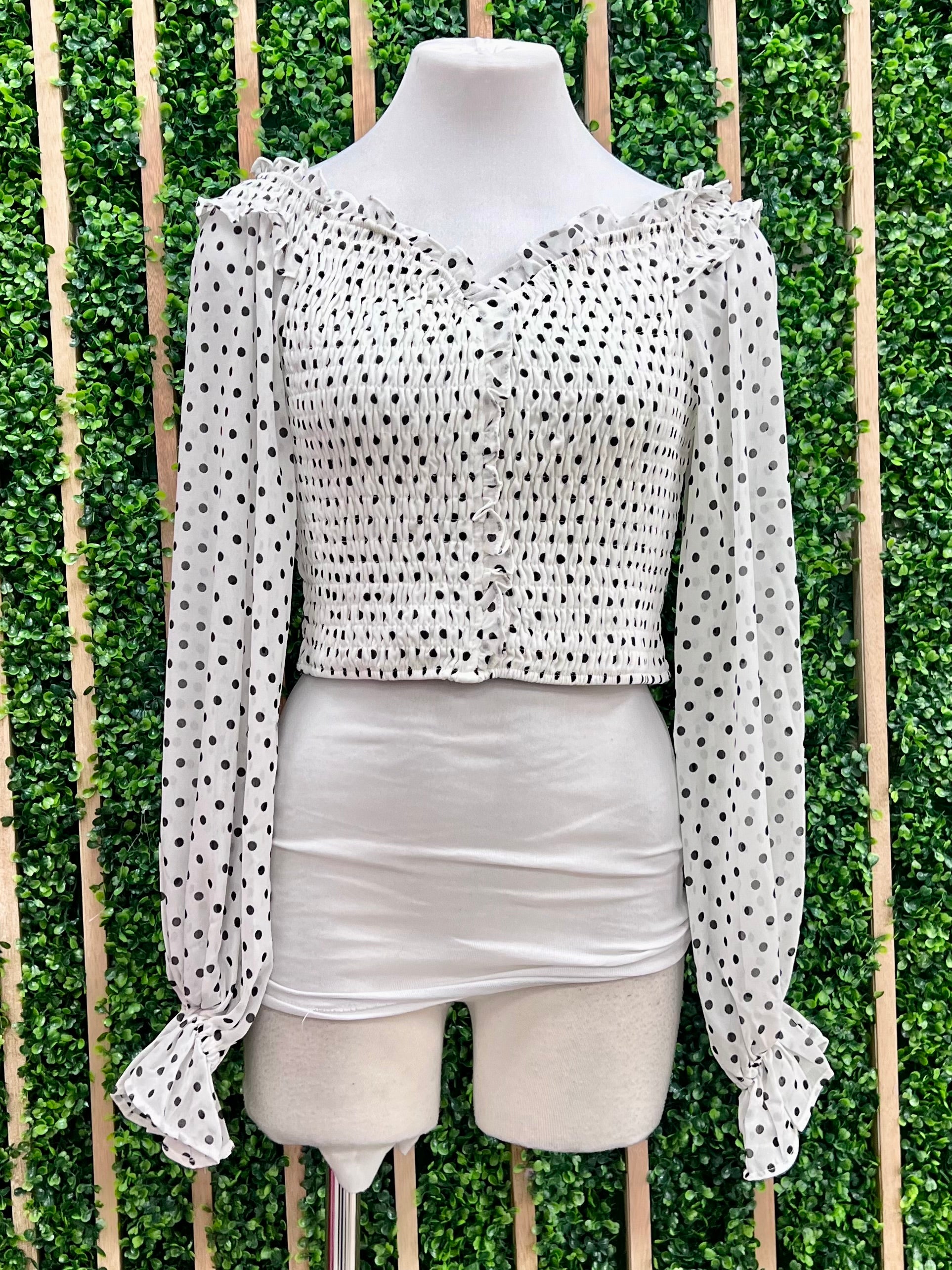 white polka dot off the shoulder top