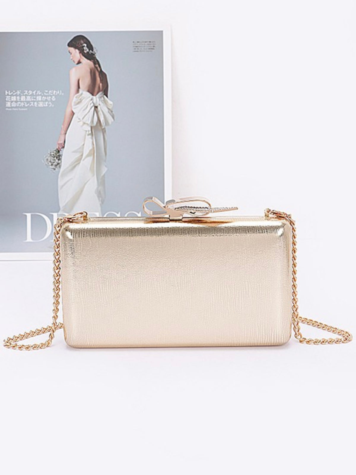 Metal Ribbon Top Clutch