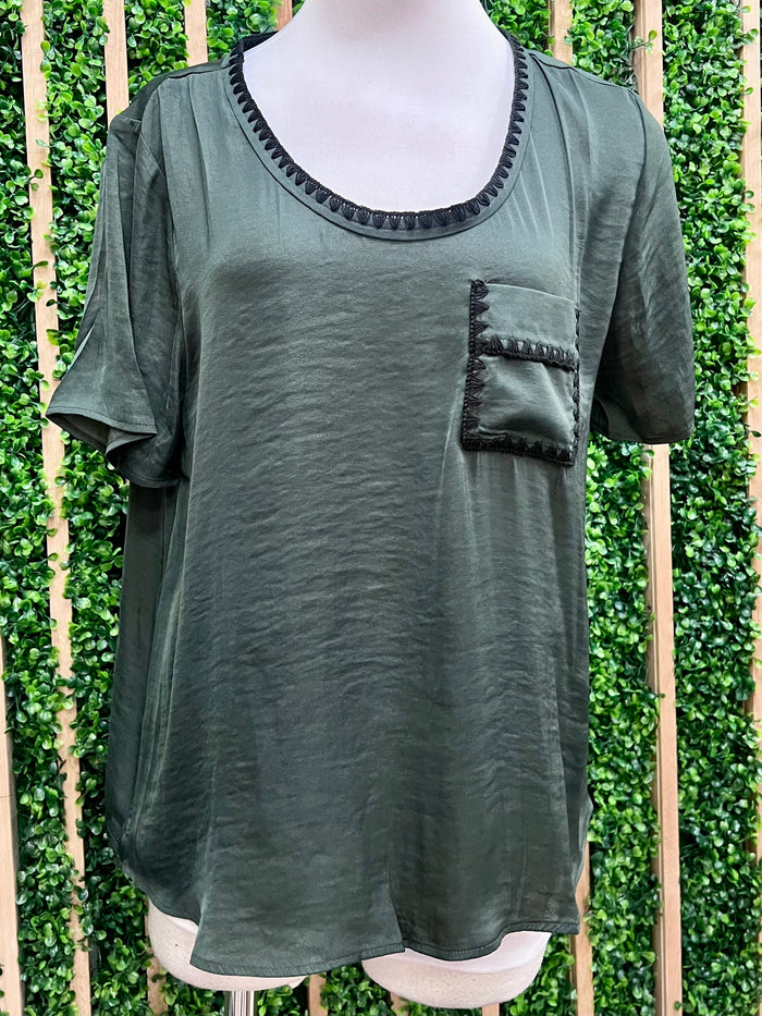 Green satin t-shirt with a pocket  and whipstitch detail. frotn view
