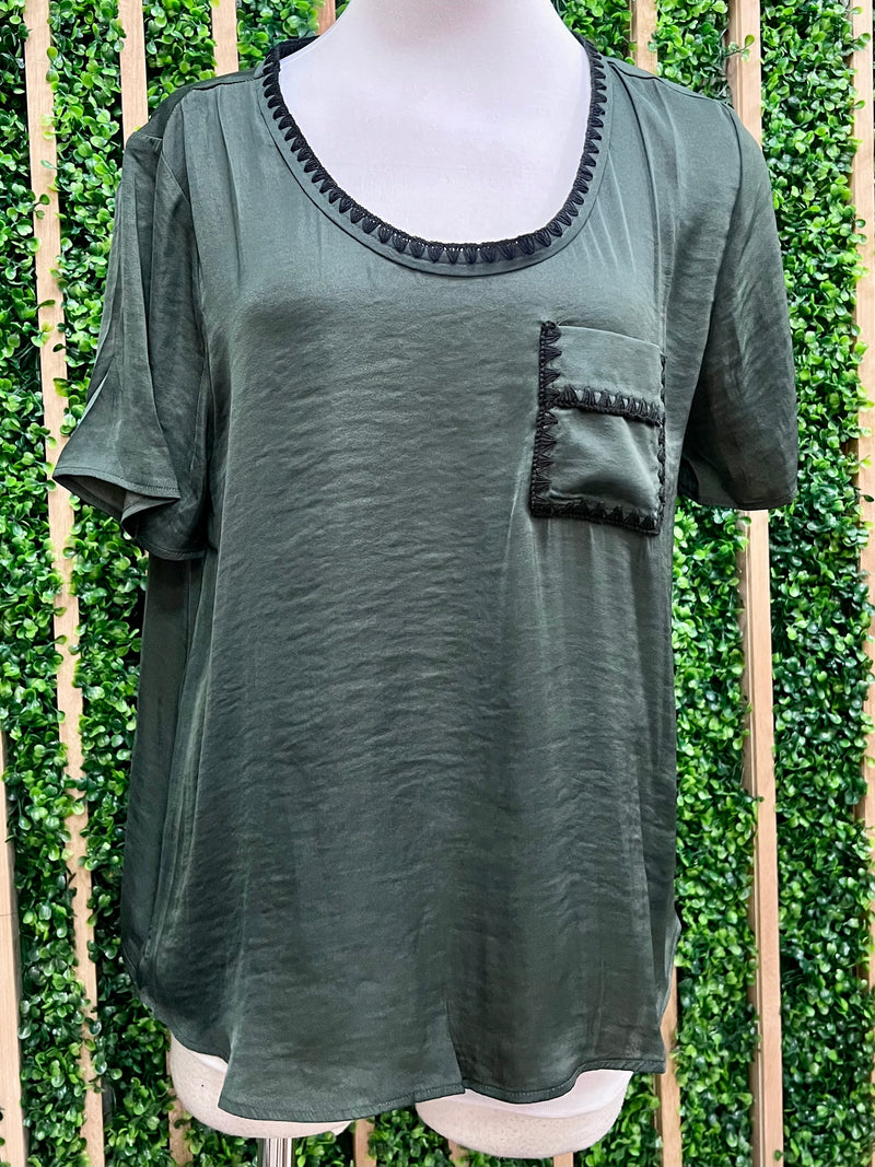 Green satin t-shirt with a pocket  and whipstitch detail. frotn view