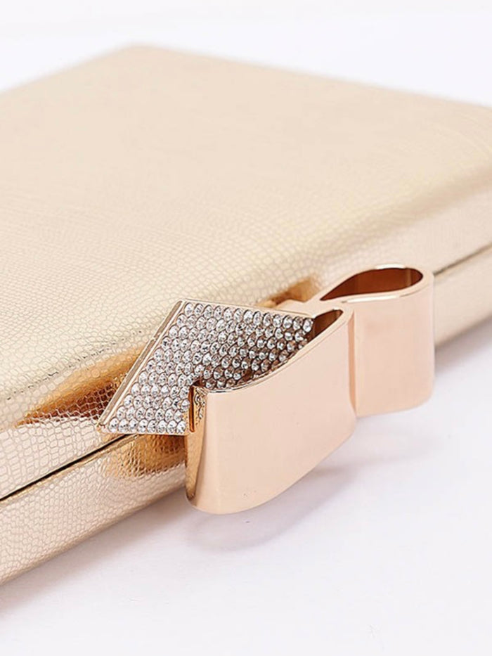 Metal Ribbon Top Clutch