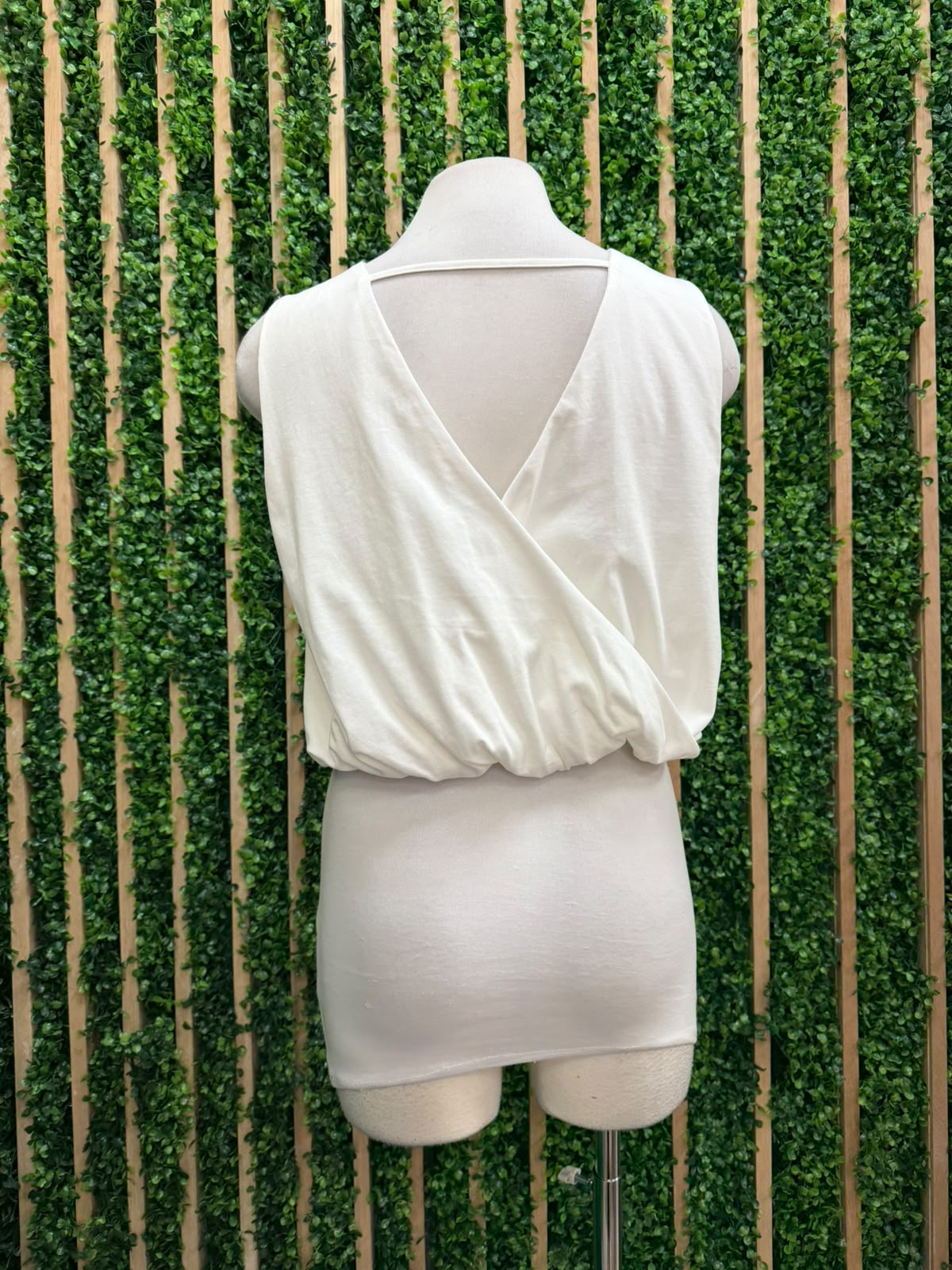 Sleeveless Bubble Hem Top