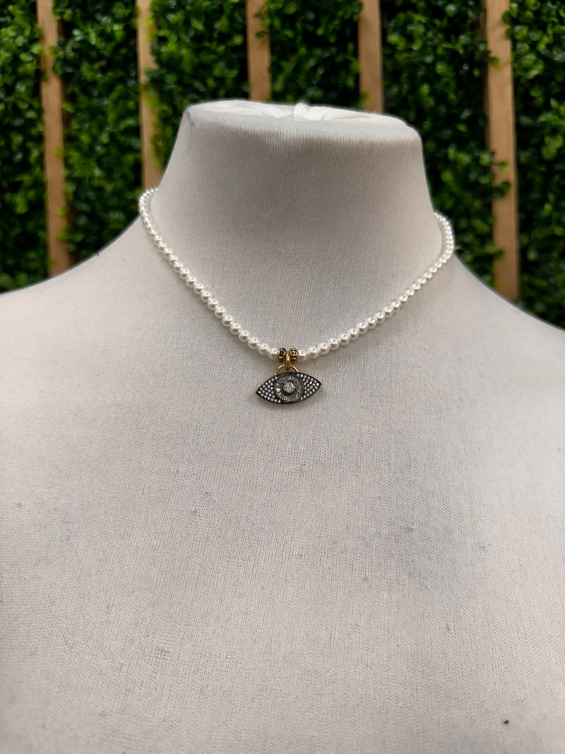 MR Poised Eye Pearl Necklace