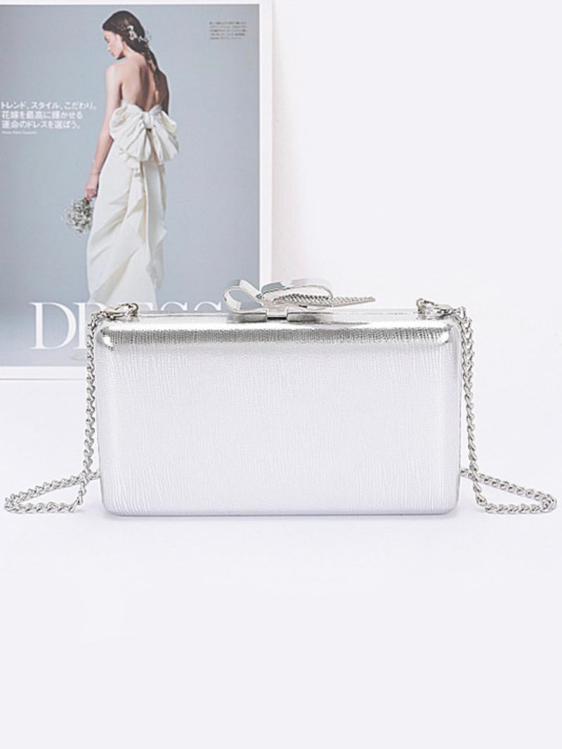 Metal Ribbon Top Clutch