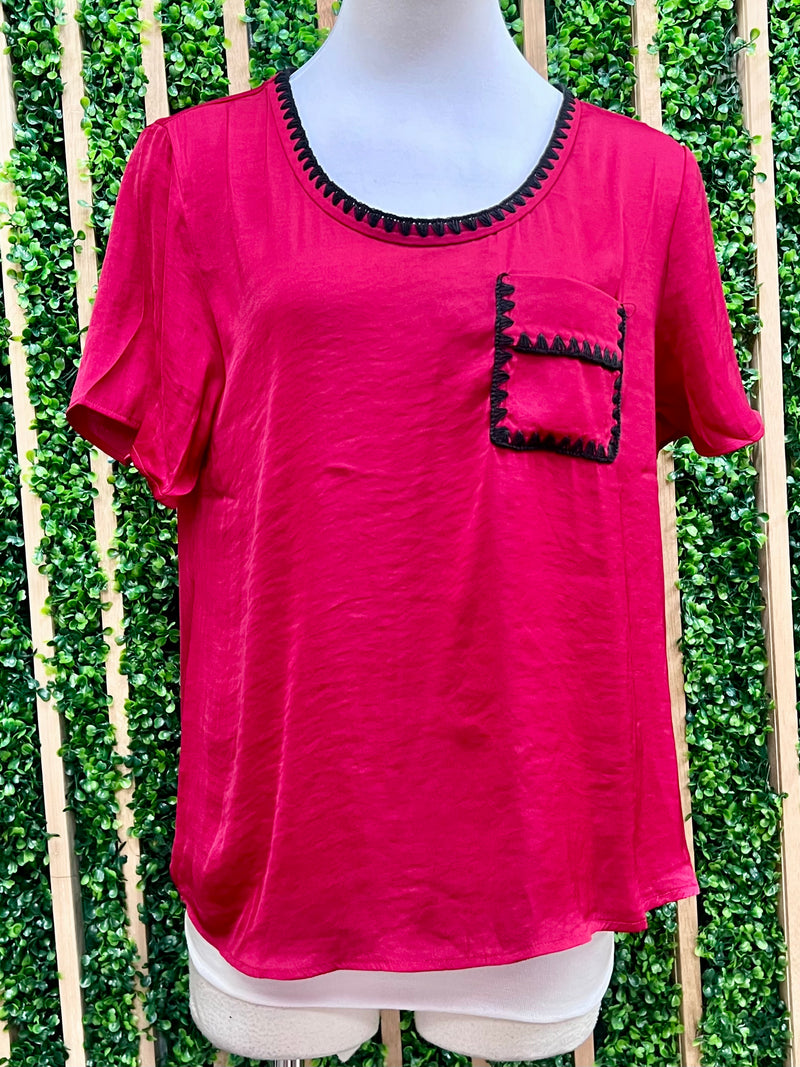 Red satin top with whipstitch black trim 